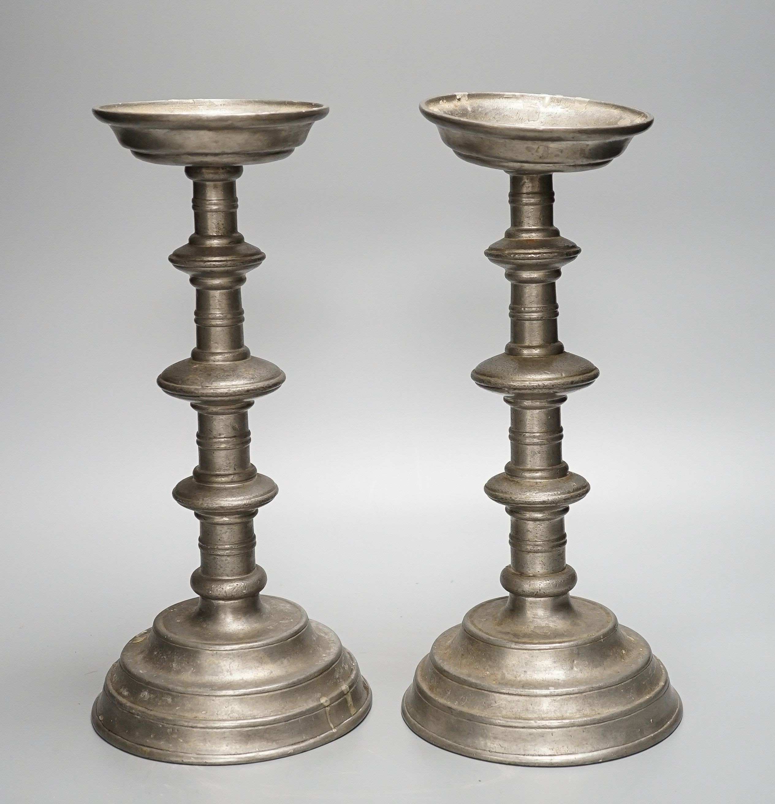 Pair of pewter candle-stands 32cm